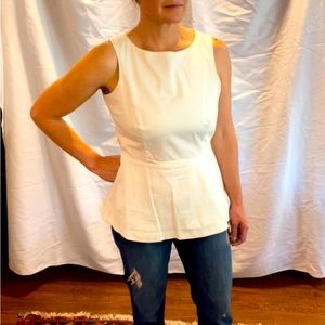 Banana Republic White Sleeveless top. Back zipper and eye hook.